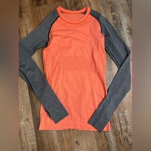 Lululemon woman’s coral and grey long sleeve swiftly tech